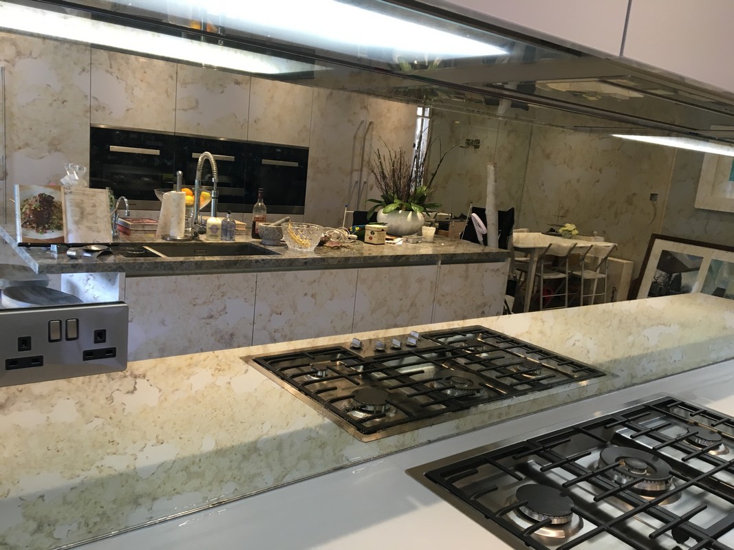 Mirror glass splashback in Islington luxury kitchen