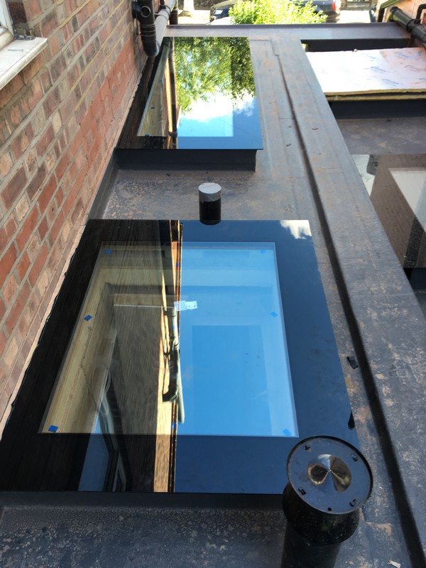 Multiple flat roof skylights on extension in Islington
